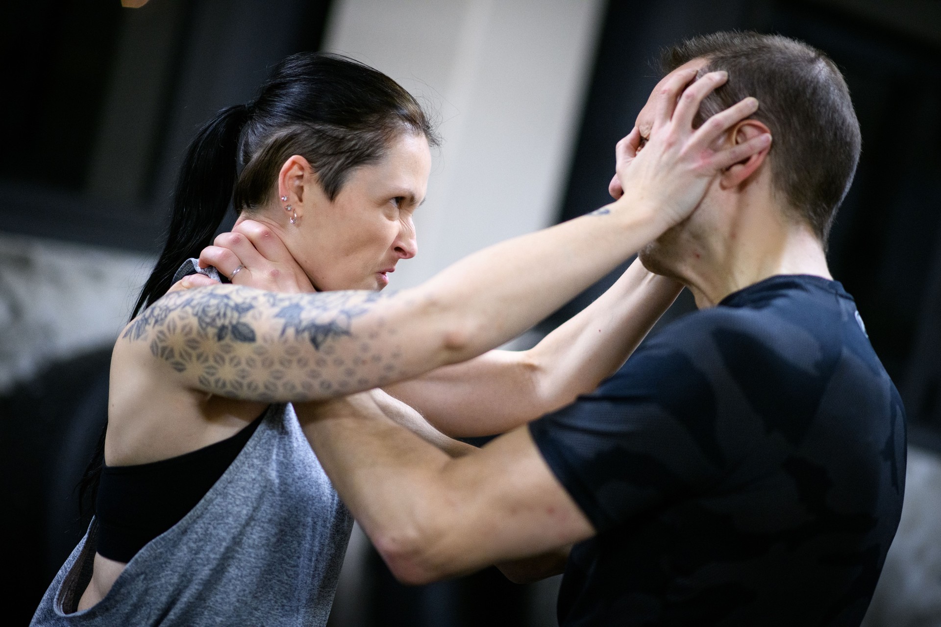 Self defense, woman training with instructor